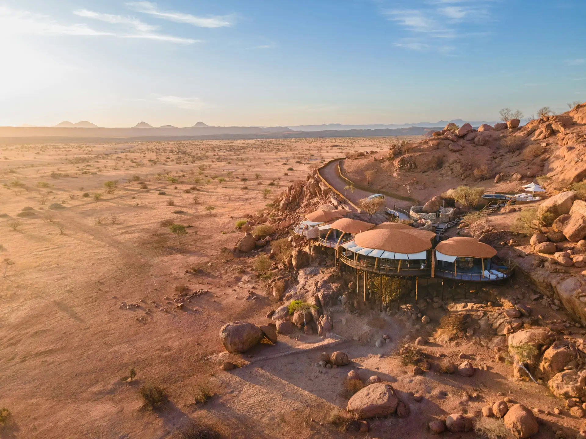Ultimate Safaris Namibia review: aerial view of Onduli Ridge camp nestled among granite boulders in Damaraland