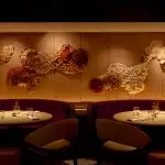 The dining room at Bonheur, Matt Abé's two-Michelin-star restaurant on London's Upper Brook Street, featured in Traveler Magazine's best new restaurants of 2026