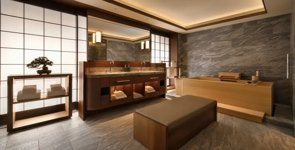 Capella Kyoto Review 2026: Inside Japan's Most Anticipated Luxury Opening 9 Capella Kyoto bathroom with hinoki wooden bathtub and granite countertops