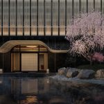 Capella Kyoto entrance with cherry blossom and onsen reflection in Miyagawa-cho