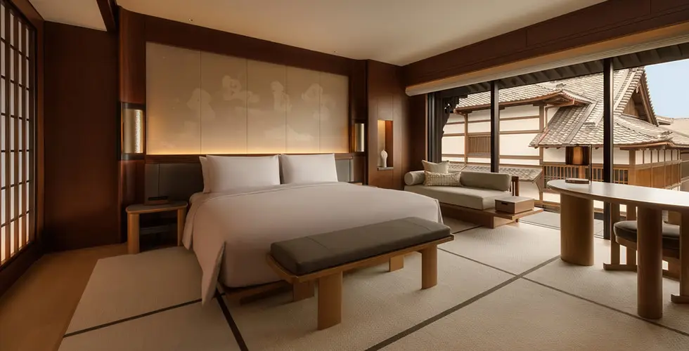 Capella Kyoto Review 2026: Inside Japan's Most Anticipated Luxury Opening 8 Capella Kyoto Gion Suite bedroom with tatami floors and Higashiyama rooftop view
