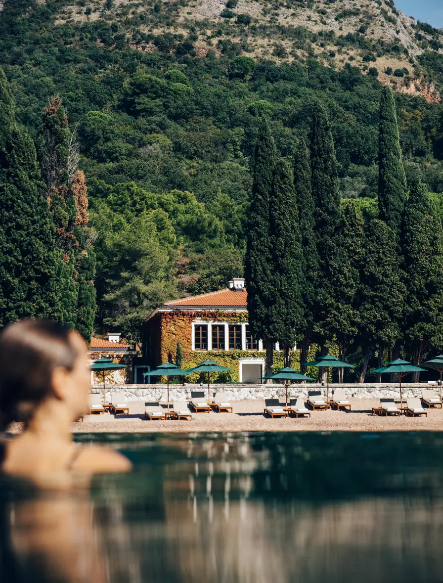 After five years, Aman Sveti Stefan reopens on the Adriatic 5 Queen's Beach and the ivy-covered Queen Marija annex at Aman Sveti Stefan, the private beach kept exclusive to hotel guests under the 2026 settlement.