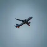 SAS most punctual airline 2026 - Scandinavian Airlines Airbus aircraft climbing at dusk