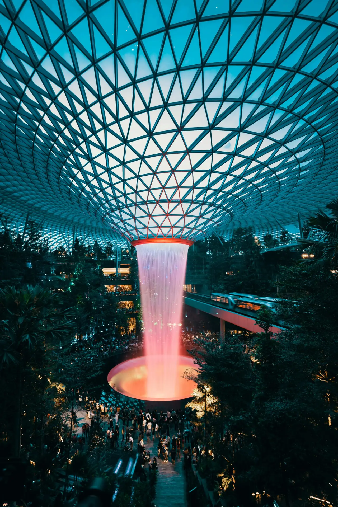 Solo travel destinations 2026: the Rain Vortex inside Jewel Changi Airport in Singapore, the world's most-awarded airport and an ideal soft landing for first-time solo travelers heading to Asia