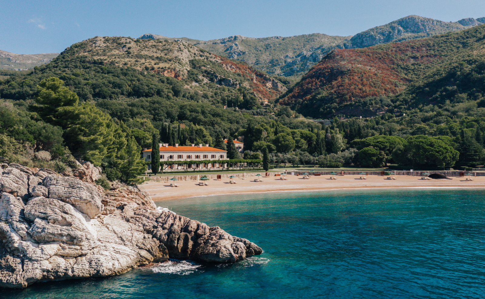 After five years, Aman Sveti Stefan reopens on the Adriatic 2 Villa Miločer and King's Beach at Aman Sveti Stefan, the year-round mainland wing of the Montenegro resort reopening May 2026.