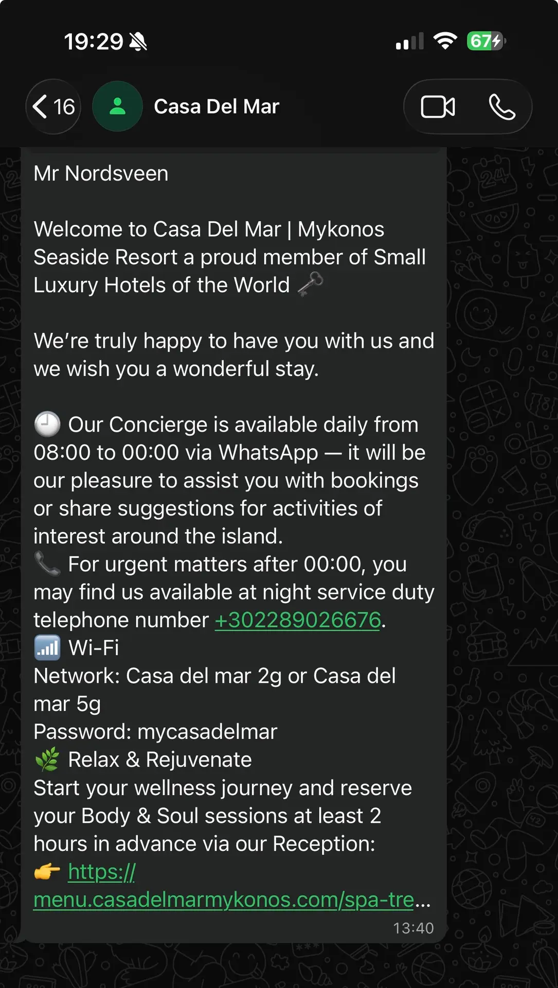 Casa Del Mar Mykonos: A Week on the Quiet Side of the Island 15 WhatsApp welcome message from Casa Del Mar Mykonos concierge with stay details including concierge hours, Wi-Fi and spa booking, shown on a phone screen