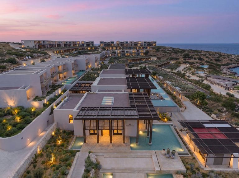 JW Marriott Crete review: aerial view of the resort at sunset with private pools and Souda Bay