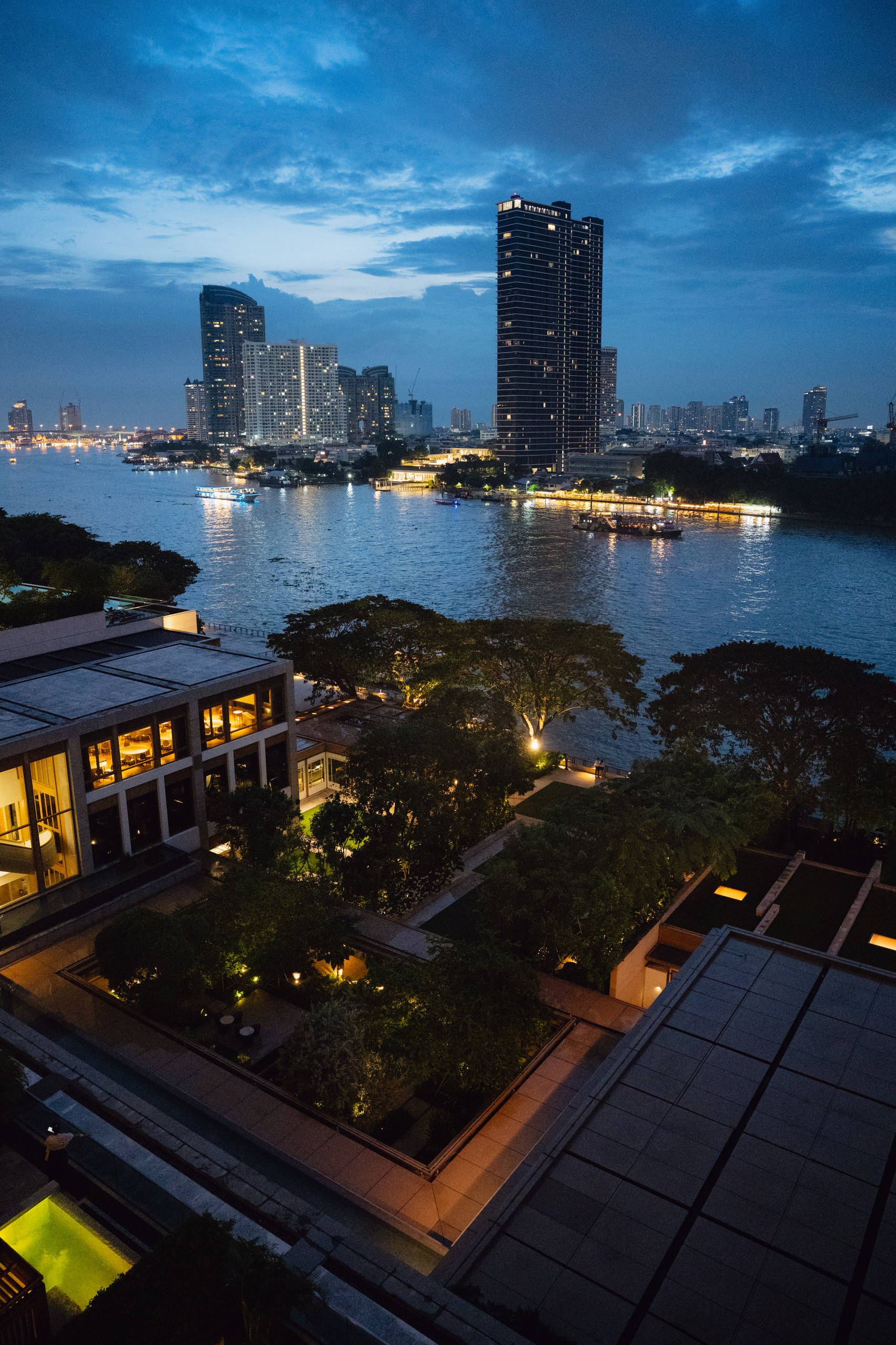 Chao Phraya River and the Capella Bangkok garden at dusk