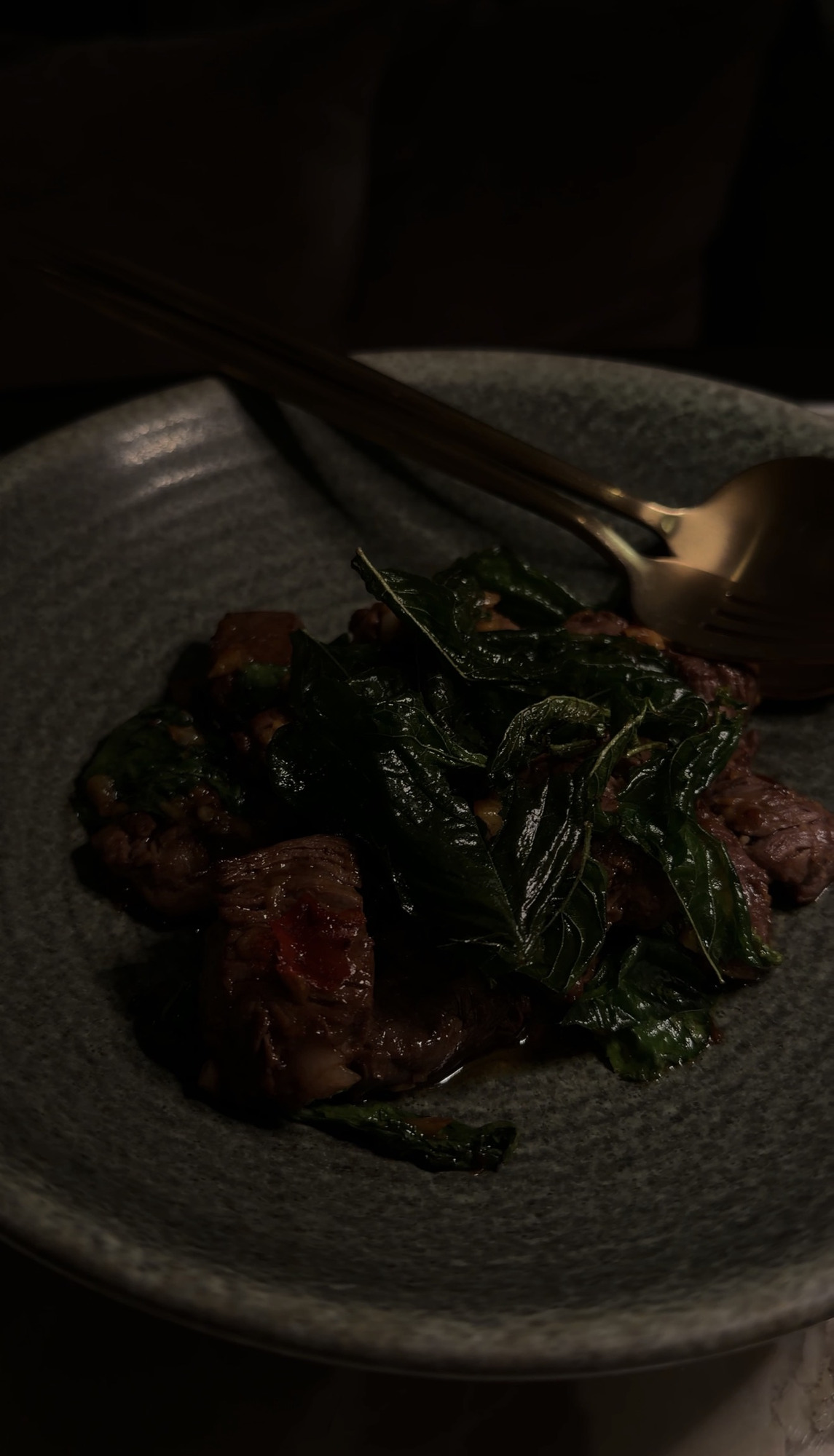 Wok-fried beef tenderloin with Thai basil at Phra Nakhon, Capella Bangkok