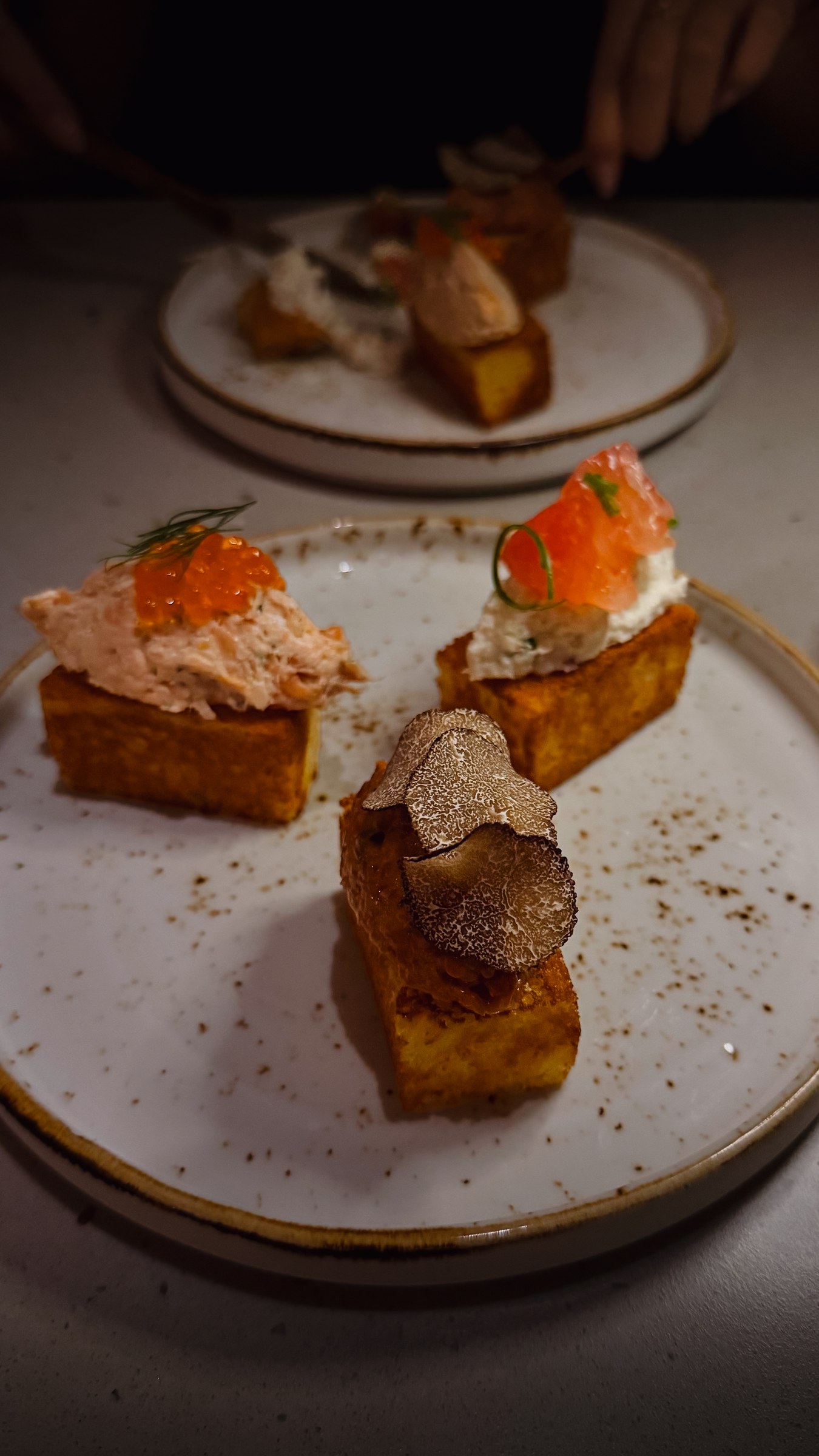 KROMO Bangkok Colette appetizers with truffle and salmon toasts