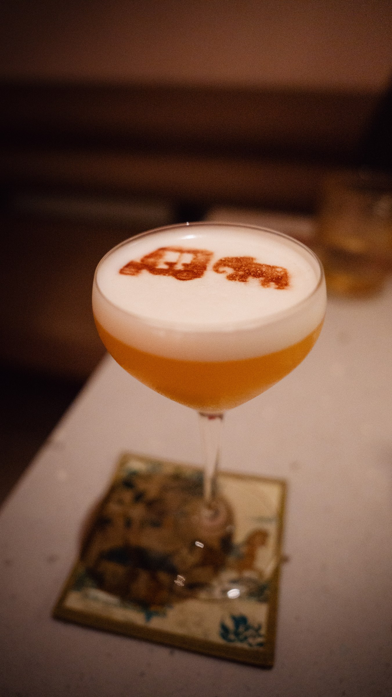 KROMO Bangkok Colette Silk Route cocktail with elephant stencil
