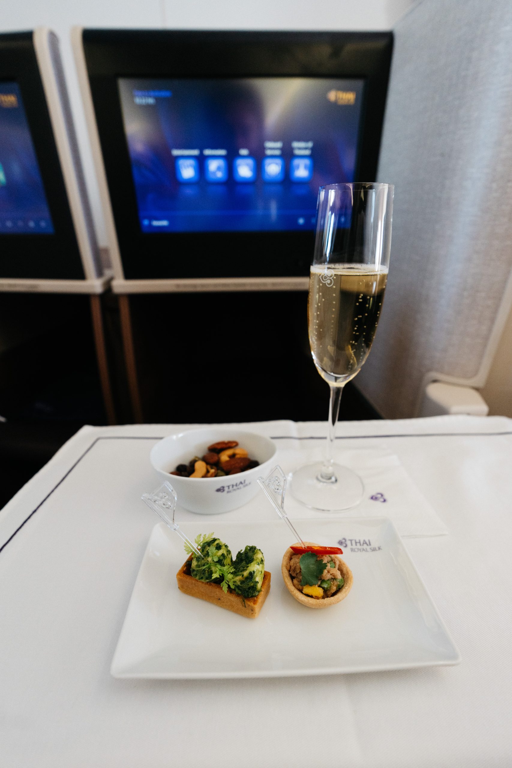 Thai Airways Amsterdam to Bangkok: a Royal Silk review of the new daily flight 3 Champagne, two canapés and a bowl of nuts served in Thai Airways Royal Silk